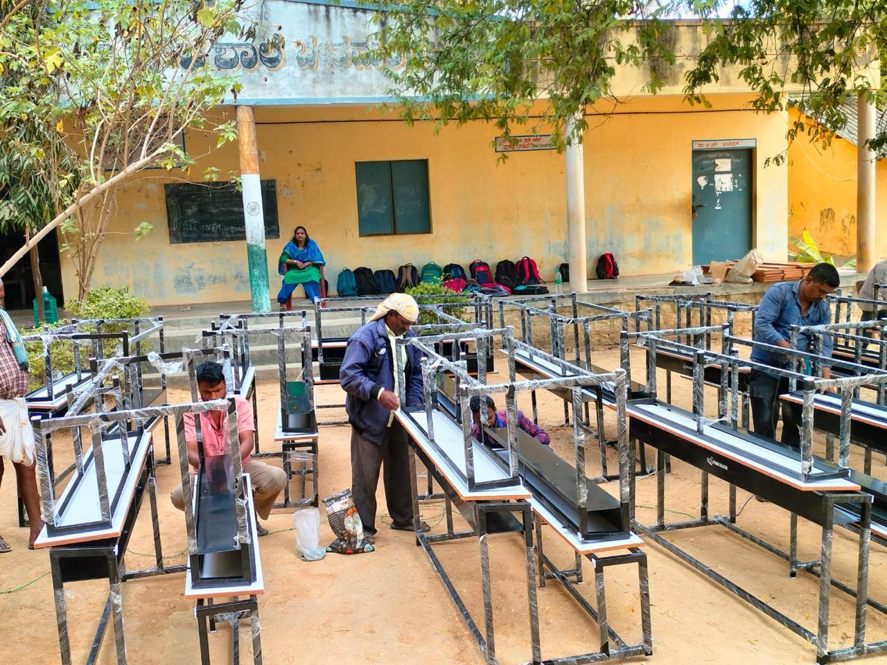Assembly of benches in Bethamangala school
